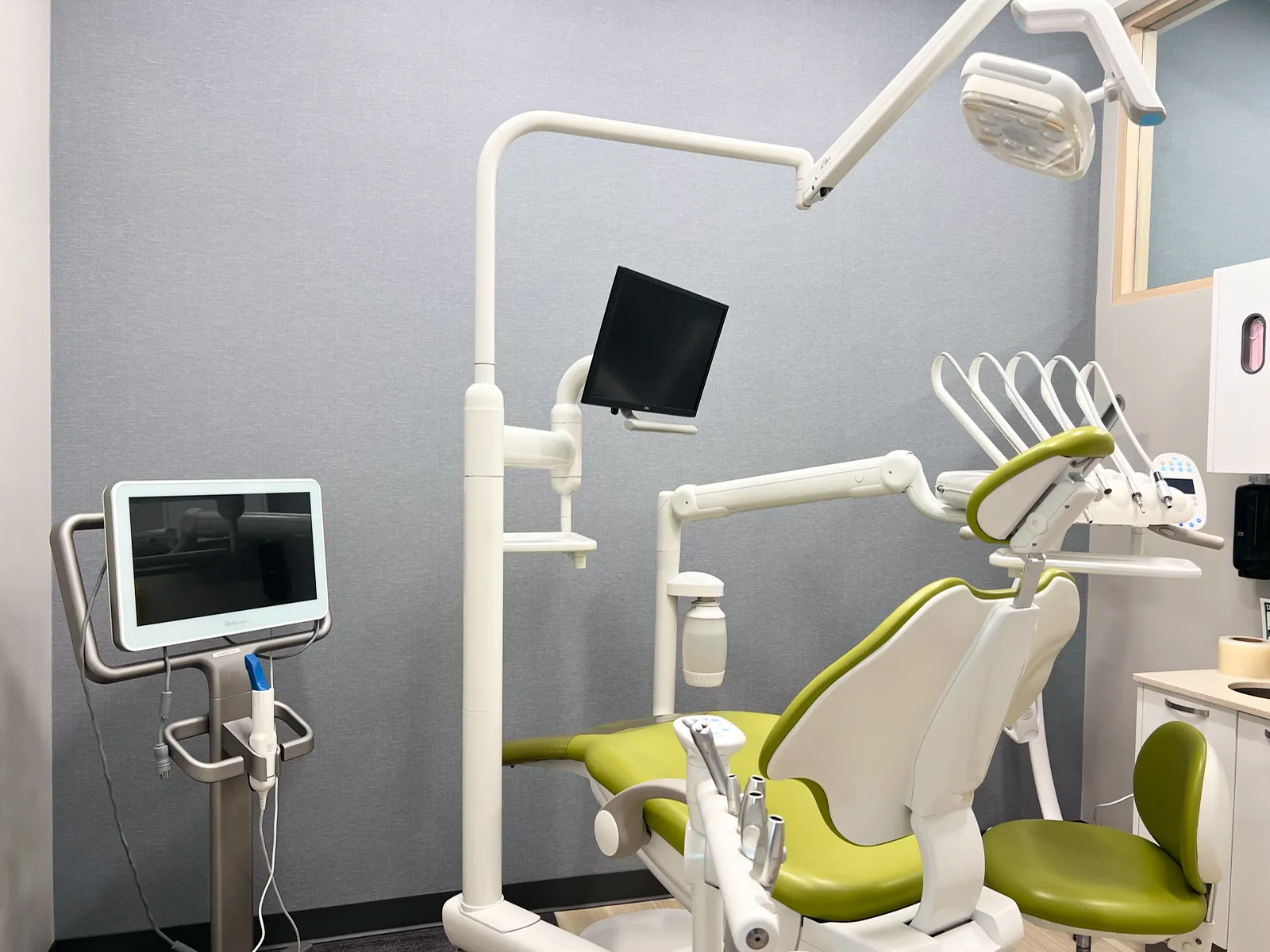 Treatment room with dental chair at Crestmont Dental